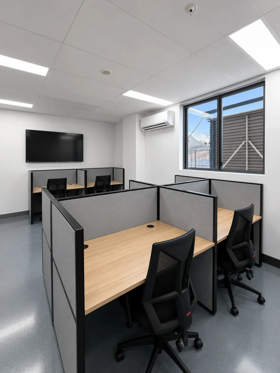 Refurbished Kraft Heinz office with workstations and breakout seating